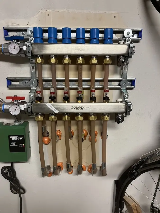 Plumber performing Water Heater Repair at a residential property in North Alamo